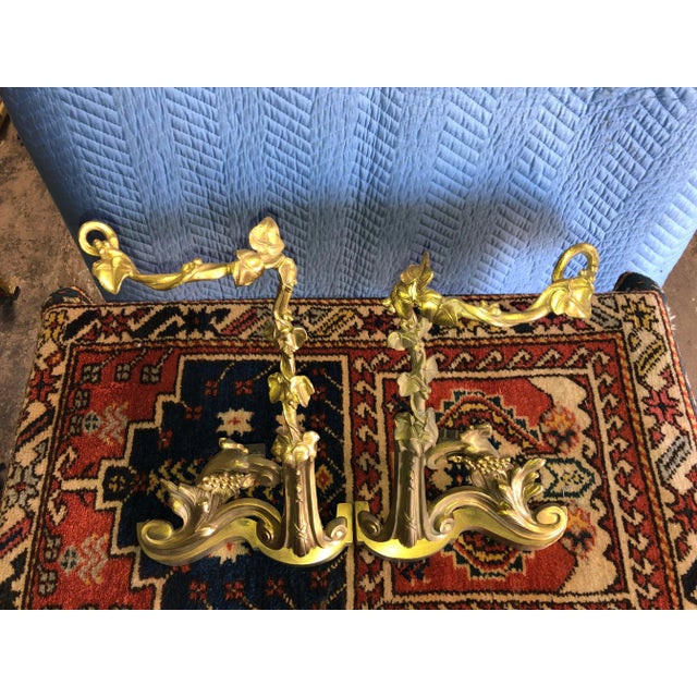 Simply a fabulous and beautifully aged pair of French Chenets. Warm patina will grace your fireplace and hearth with the...