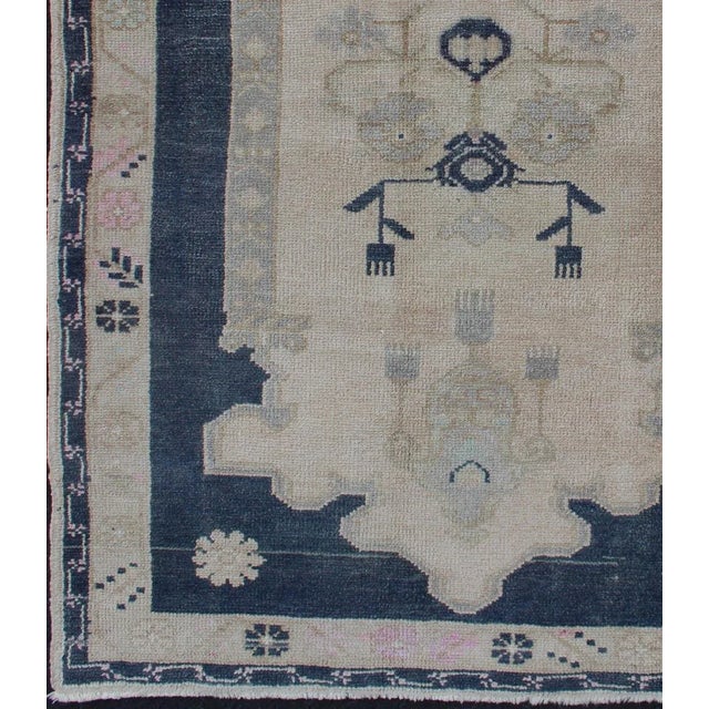 Tribal Blue and Cream Medallion Vintage Turkish Hand Knotted Oushak Rug With Tribal Geometric Design For Sale - Image 3 of 9