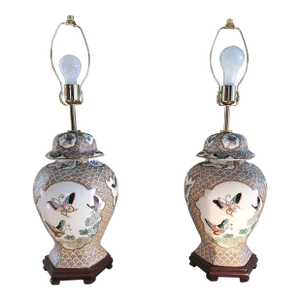 Early 20th Century Pair of Chinese Porcelain Lamps With Butterflies on Hexagon Carved Wood Bases
