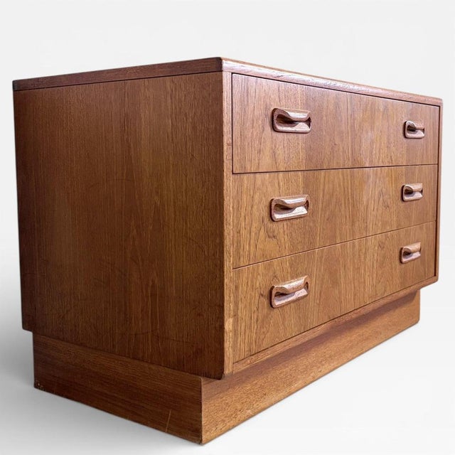 A compact and beautifully proportioned mid-century chest of drawers from g plan , part of the iconic fresco range. Crafted...