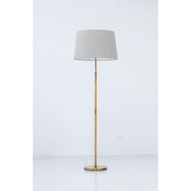 Floor lamp model 588 G designed by Anders Pehrson for Ateljé Lyktan. Produced in Sweden during the 1960s. Made from brass...