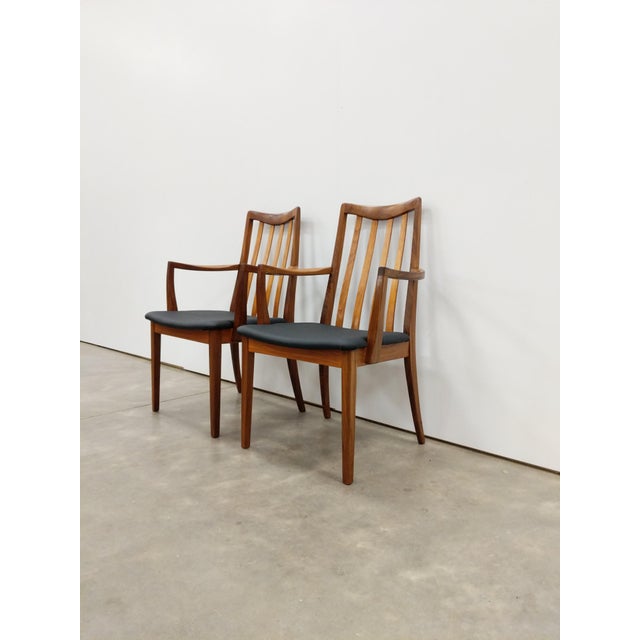 Pair of authentic vintage mid century modern armchairs / dining chairs. Designed by Leslie Dandy for G Plan. Maker's label...