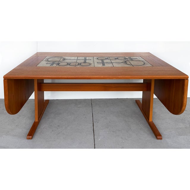 Poul H. Poulsen Gangsø Møbler Danish Tile Top Dining Table in Teak,Signed Offered for sale is a vintage Danish Modern...