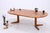 Vintage dining table by CJ Rosengaarden from the 1960s. Its clean lines, warm teak grain, and elegant base make it a...