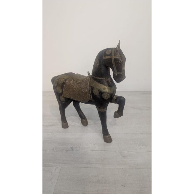 Wooden Indian Ceremonial Horse with Brass by Charles Mareck A wooden sculpture of a ceremonial horse in the Indian style,...