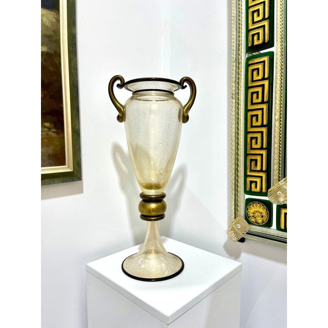 This traditional Vase exudes class and sophistication. Hand formed by Glass Master Gambaro of Murano, this piece also...