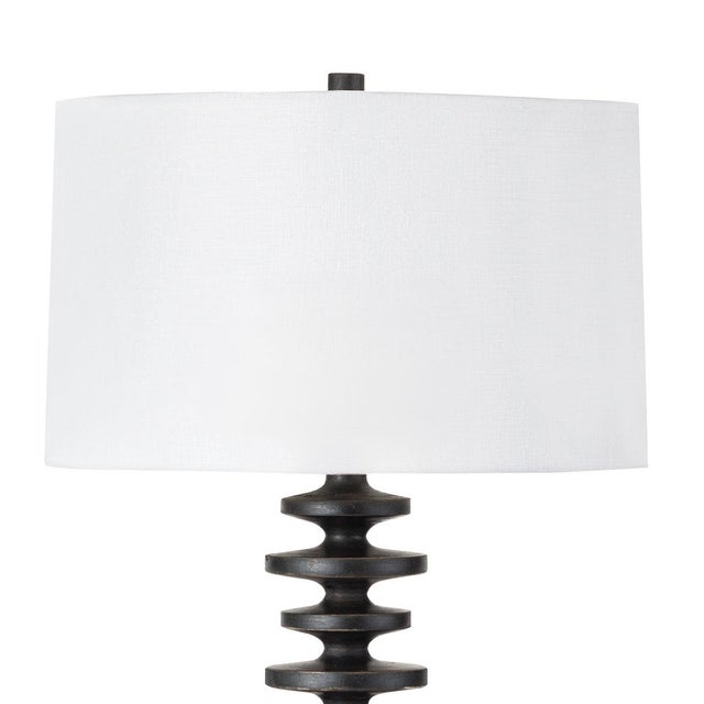 Textured bands ripple down the graduated column of our sculptural Fishbone buffet lamp. Corrugated birch wood is...