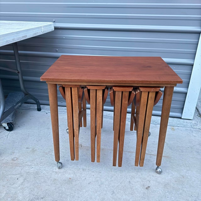 This gorgeous and compact set of side tables is perfect for guests and tight spaces. The larger rectangular table holds...