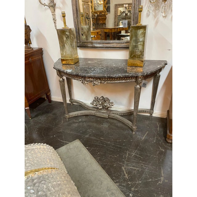 Superb 19th century French Louis XVI style silver gilt carved wood console table with a fine quality shaped marble top....