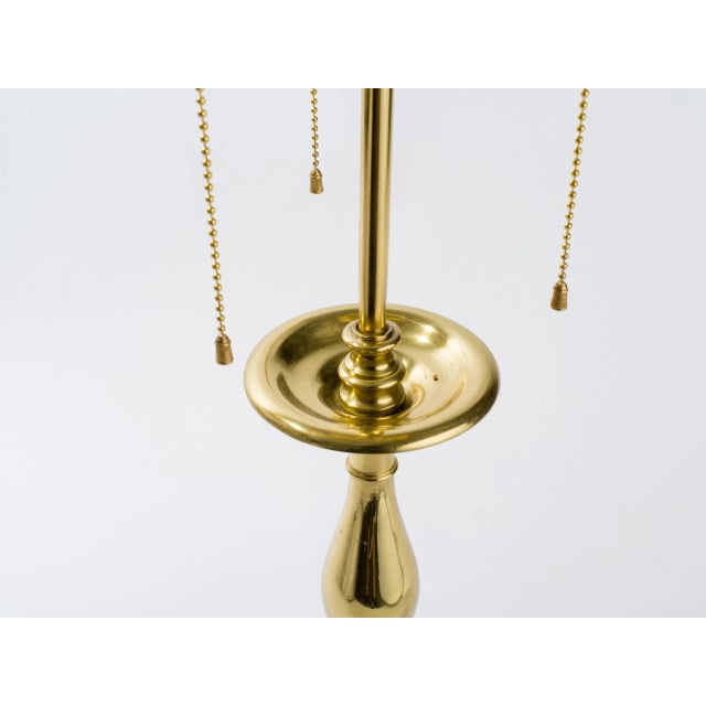 Solid brass lamp with new wiring. Restored.