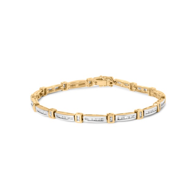 Immerse yourself in the understated luxury of the 14K yellow gold bracelet, a timeless piece exuding a classic warmth only...