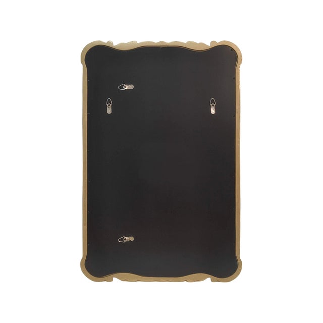 This timeless rectangular mirror features a sculpted frame with graceful scroll detailing, adding classic charm to any...