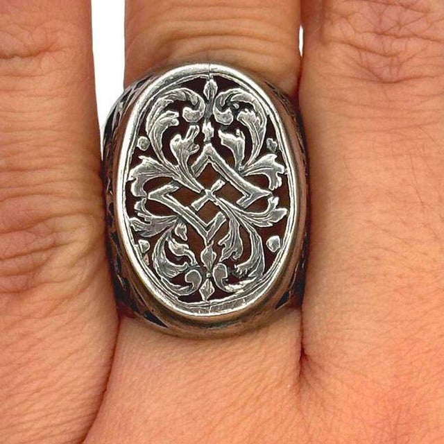 Great Boho Victorian style sterling silver statement ring showcases a cut-out tang grass pattern. The intricate design...