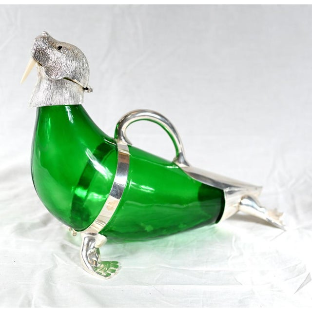 Wow - does not get any more quirky than this - a silver plate decanter in the form of a walrus i am the walrus, goo-goo...