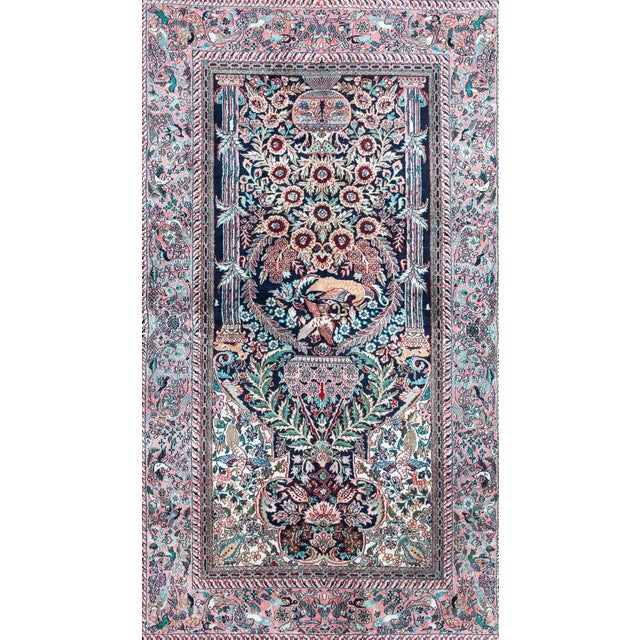 A stunning late 20th century Chinese hand-knotted silk prayer rug with the most elaborate mihrab decorated with with...
