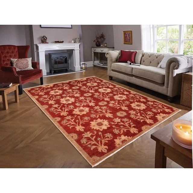 "Enhance the ambiance of your home with this magnificent Persian-influenced Turkish hand-knotted rug made by skilled...