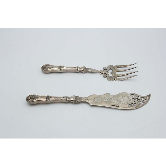 Fish Knife and Fork with Engravings and Cutouts, in Good conditions.
