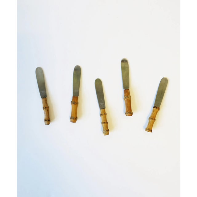 A great set of five (5) small appetizer knifes with stainless steel blade (dull) and real natural bamboo handles, circa...