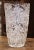 This elegant vintage glass vase combines a substantial form with sparkling decorative detail. Crafted in France circa...