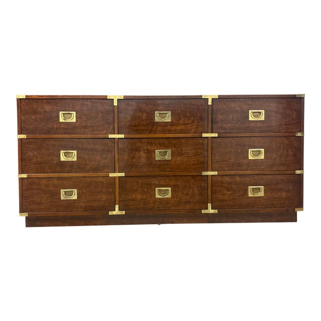 Wow! We just love this truly special, absolutely stunning Campaign piece by Henredon. This gorgeous lowboy features a rich...