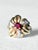 Vintage 18K yellow gold flower ring featuring a sculpted plumeria style blossom with overlapping petals, centered by a...