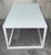 New modern rectangular white table with glass top. Indoor or outdoor. Wrought iron.