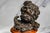 A delightful example of early 20th-century decorative art, this circa 1910 bronze cherub sculpture captures the timeless...