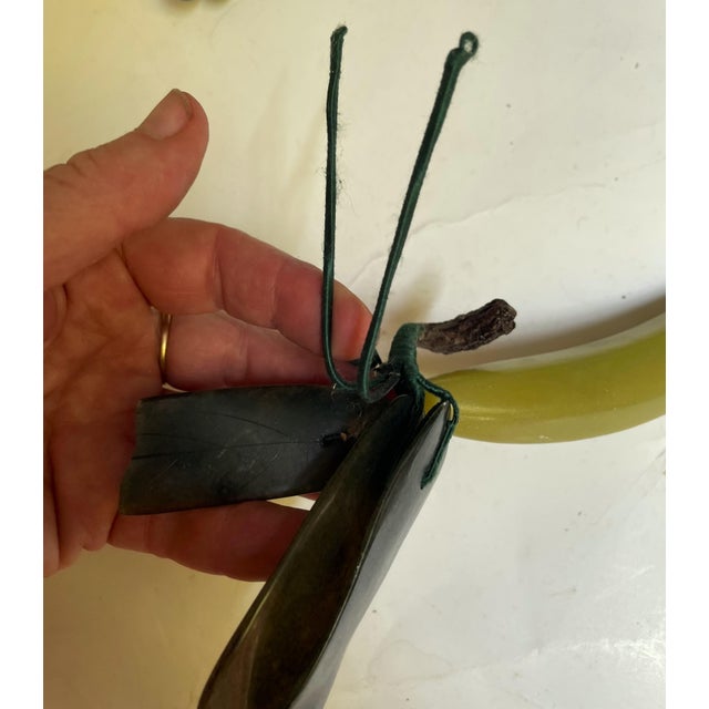 Love the yellow green color of this fruit but I'm not sure if it is a banana or a fruit that looks like a small, skinny...