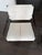 These stunning chairs from Oly Studio showcase a mixed-material design featuring premium cream-colored natural hide...
