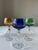 A set of six wine glasses made of coloured crystal glass with an elegant geometric cut. This piece is attributed to the...