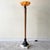 Amazing postmodern floor lamp hand made in the Philippines for Kreiss. Features a stone base with a wooden body and...