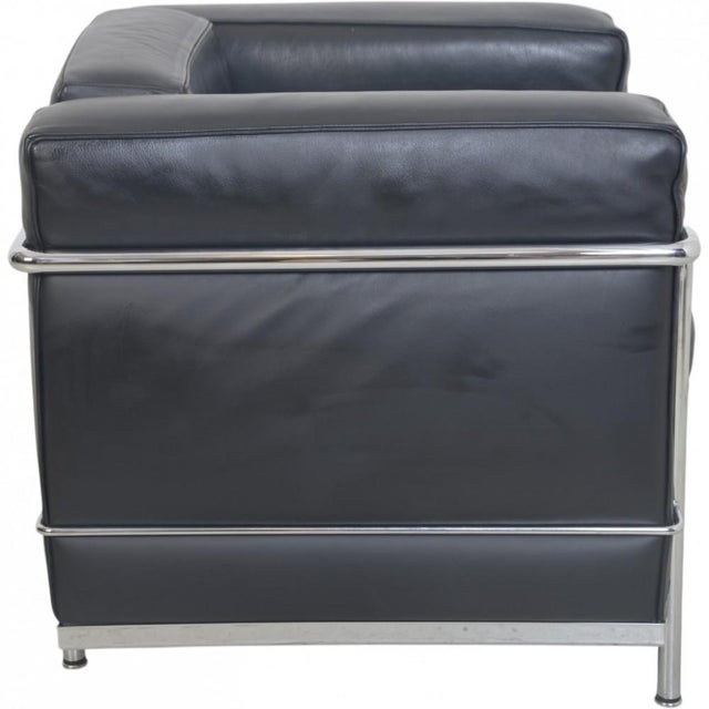 Le Corbusier LC2 chair upholstered in black leather and with a chrome frame. The chair is from the 2000s and appears in...
