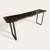 Large-scale spalted maple console table with a dark-finished slab top and symmetrical steel base. The maple was reclaimed...