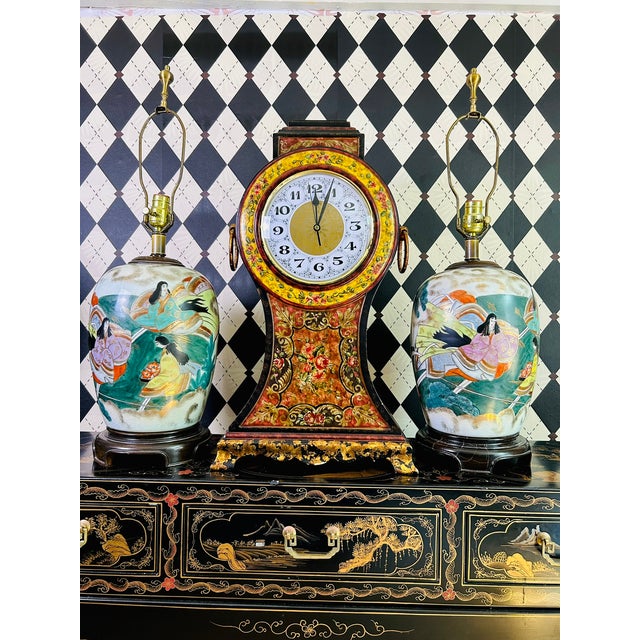 Oversized decorative mantel clock by Castilian Imports in an Italian Florentine style. The sculptural case features hand-...
