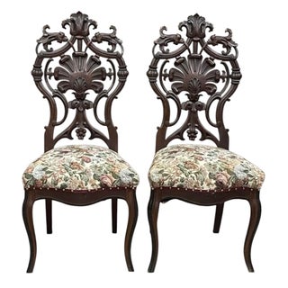Late 19th Century A Pair of Carved Victorian Parlor Chairs in the Style of Joseph Meeks For Sale