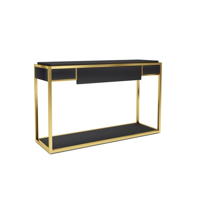 Designed by IC and realized by skilful Italian artisans, the Leandro console features one drawer standing on a brass – or...
