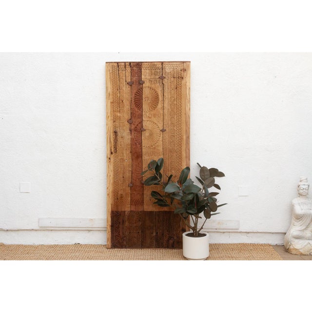 This door is a celebration of imperfection. Reconstructed from fragments of antique architectural elements, it has been...