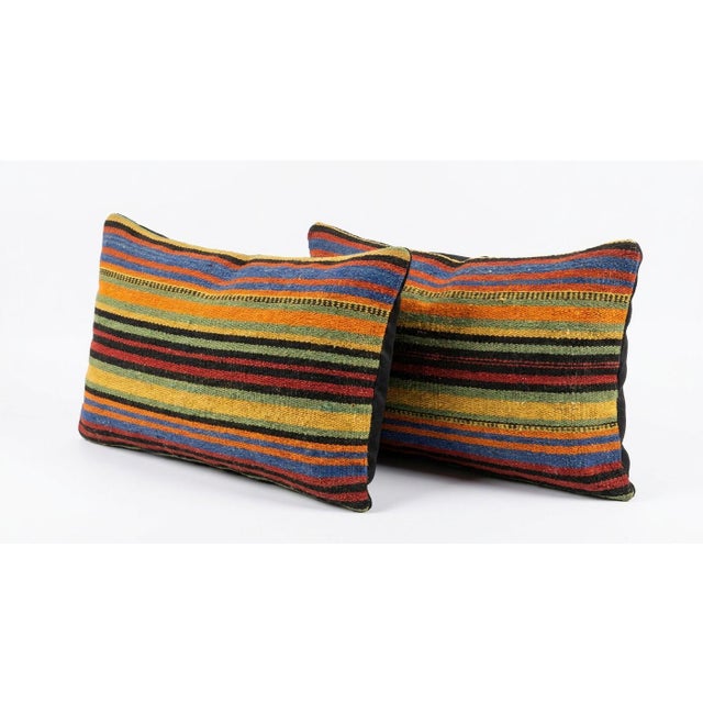 This beautiful 14'' x 20'' & 14'' x 24'' hand-woven Kilim pillow cover set was made from authentic Turkish kilim. The...
