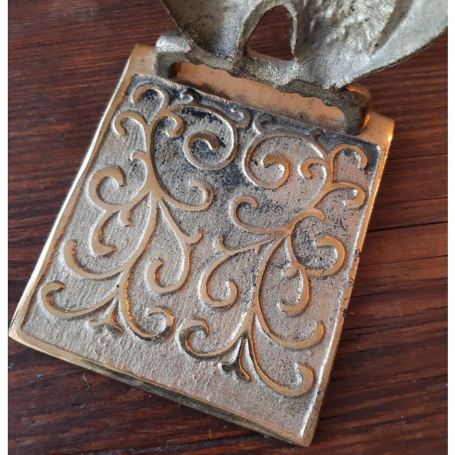 Wow matched pair of brass owl bookends with incredible detailing. The front features upright owls on a perch with...
