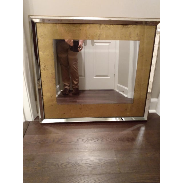 This is a vintage mirror with antique glass in gold and silver. It's in good used condition and measures 30 in tall by 33...
