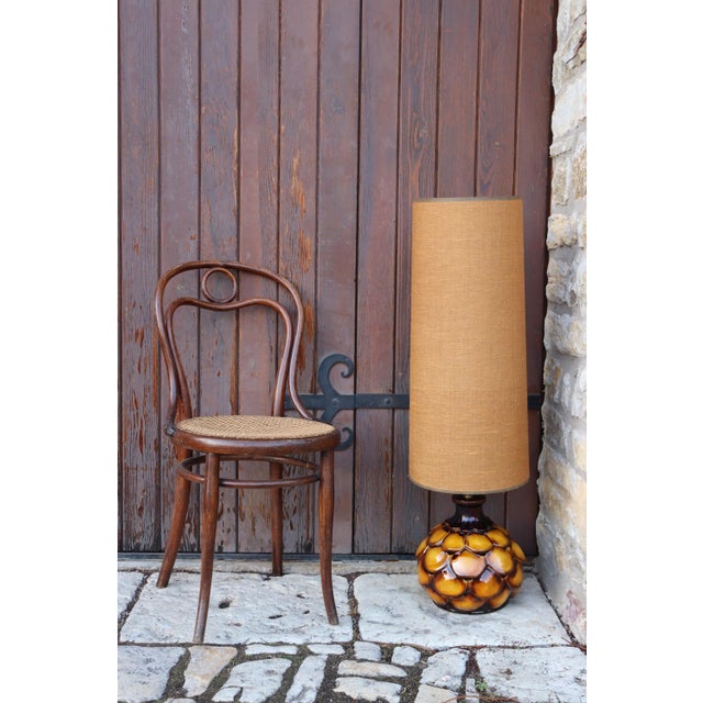 "Artichoke" lamp, made by Walter Gerhards, Germany. Circa 1950. The lamp base is made of ceramic with openwork in places....