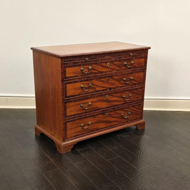 A George III–period mahogany chest of drawers, England circa 1790.
