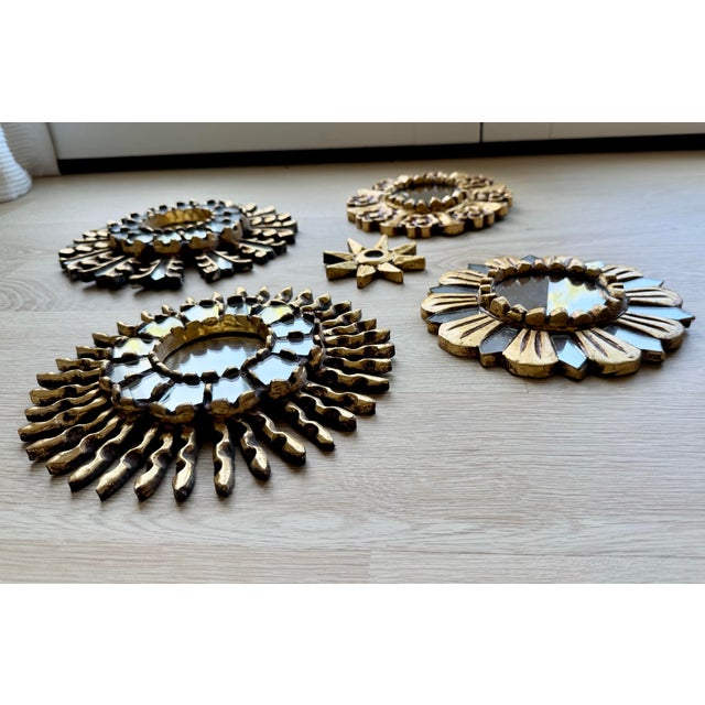 A beautifully curated collection of five vintage hand-carved Peruvian mirrors from the personal collection of an interior...
