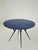 Vintage round table dating back to the 1950s, typical of Italian modernism. The design features elements typical of...