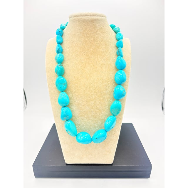 This vintage turquoise nugget necklace showcases exceptional high‑grade turquoise with clean blue color and minimal...