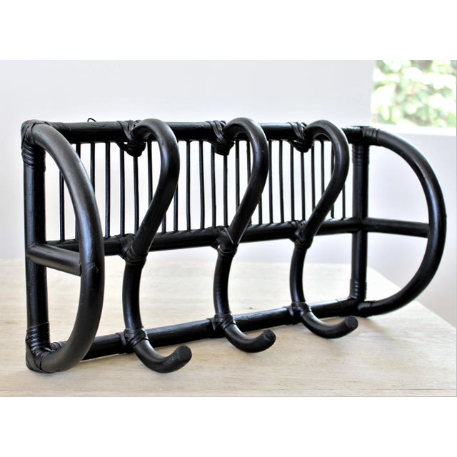 Natural Boho/Minimalist bent bamboo and rattan coat/hat rack. Perfect to hang coats, bags, dog leashes, towels, and...