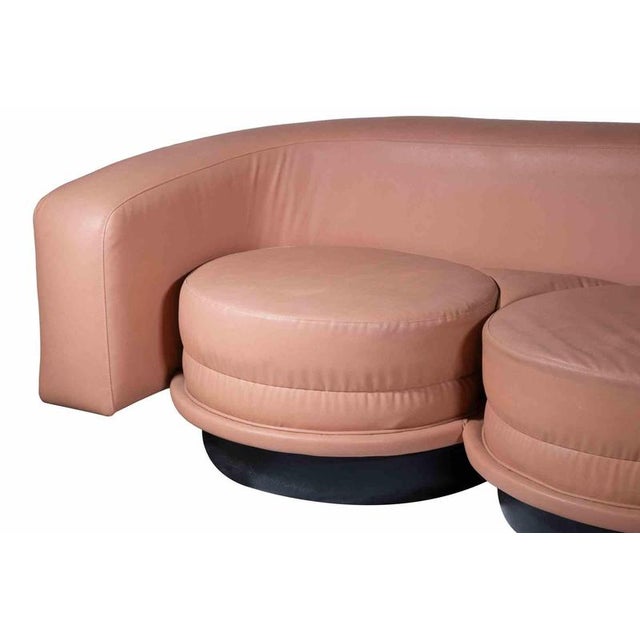 Set of three-seater sofa and two chairs in pink leather italian production of 1960s, in the style of Franz Sartori....