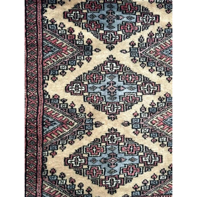 Pretty small vintage Pakistani rug with nice geometrical design in style of Turkmen rugs, and beautiful colours with beige...