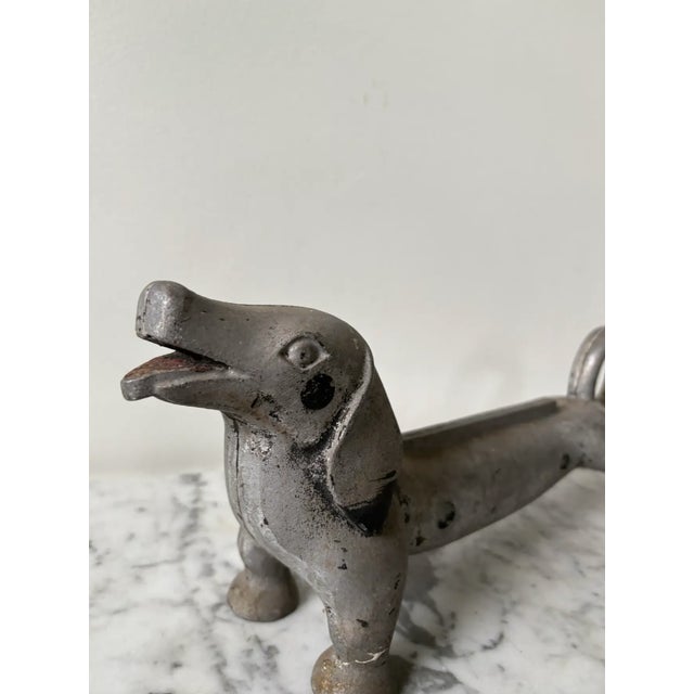 Rare antique mixed metal dachshund doorstop/shoe scraper.