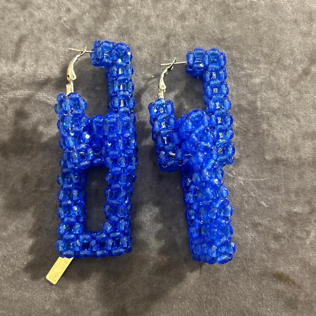 This captivating pair of earrings by Coppola e Toppo is a vibrant, contemporary creation from the 21st century, echoing...